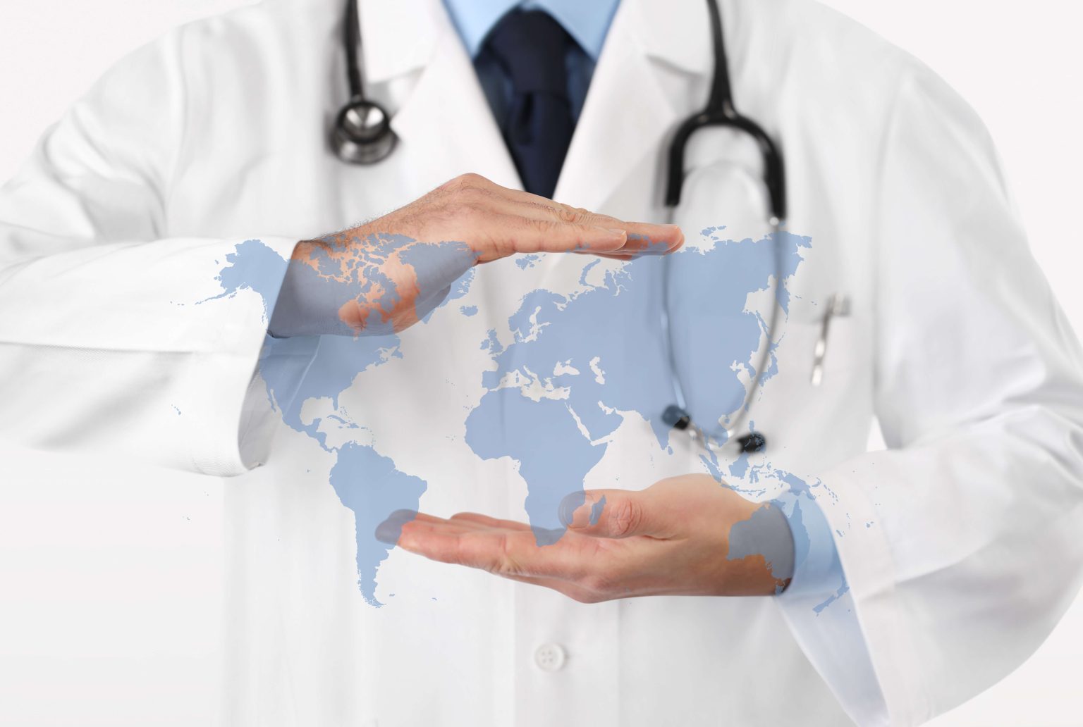 Physician cradling a world map, symbolising global healthcare partnerships